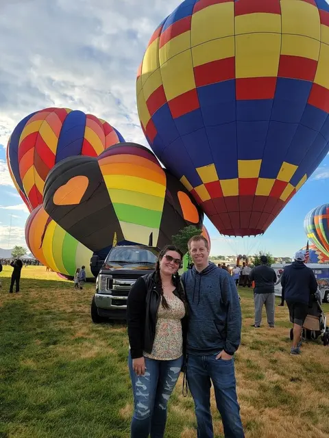 Watching hot air balloons launch at sunrise