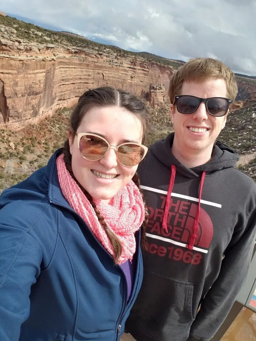Brianna and Evan on an early hike above a canyon in western Colorado